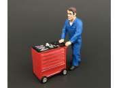 AT-Collections | Figures Figures | ADF32111 | 1/32 | Harry pushes tool trolley  (New Holland Blue) | 